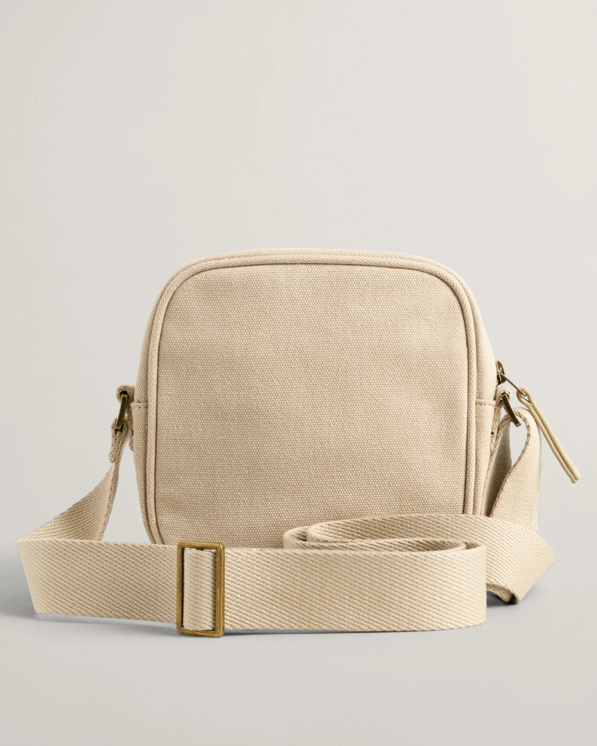Tonal Shield Crossbody Bag